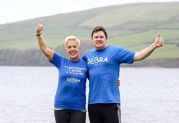 Helen Finnerty and Ciaran Mahony walking outdoors, making friends in Debra Ireland’s Kerry Challenge. 